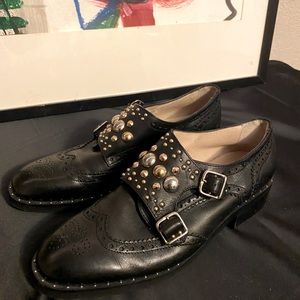 Black studded / grommet Maje loafers